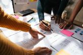 Experts collaborating on wireframes during a user experience audit